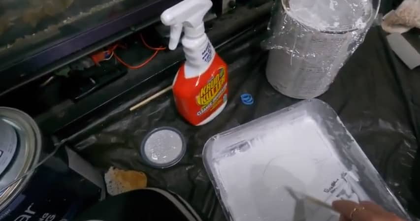 gather-materials-for-painting-a-fireplace-tile